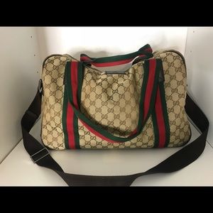 Authentic Gucci canvas duffle/travel bag.